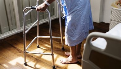 patient using walking frame